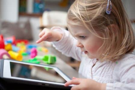 toddler typing on tablet_parenting in the digital age